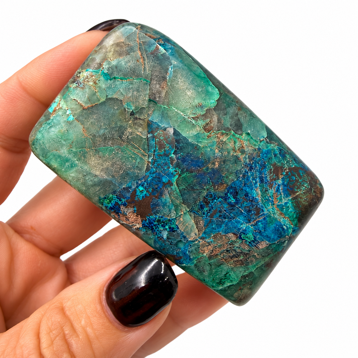 Polished shattuckite freeform from Congo in blue, teal and green, next to a quarter for scale - Magick Souls