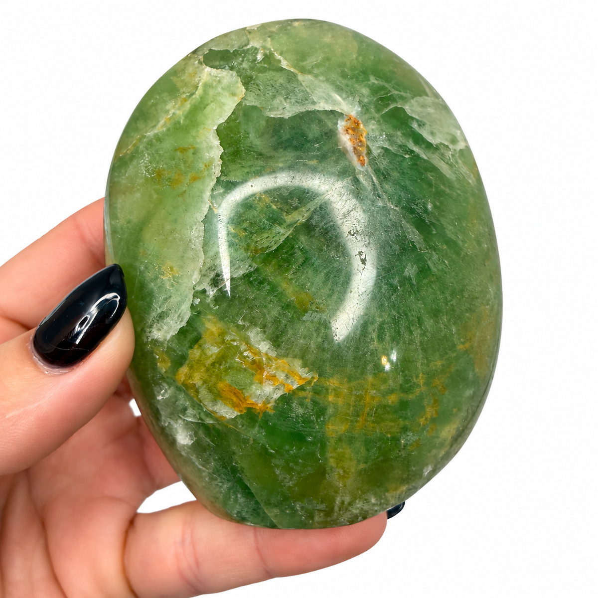 Green fluorite freeform showing translucent green layers and natural inclusions - Magick Souls