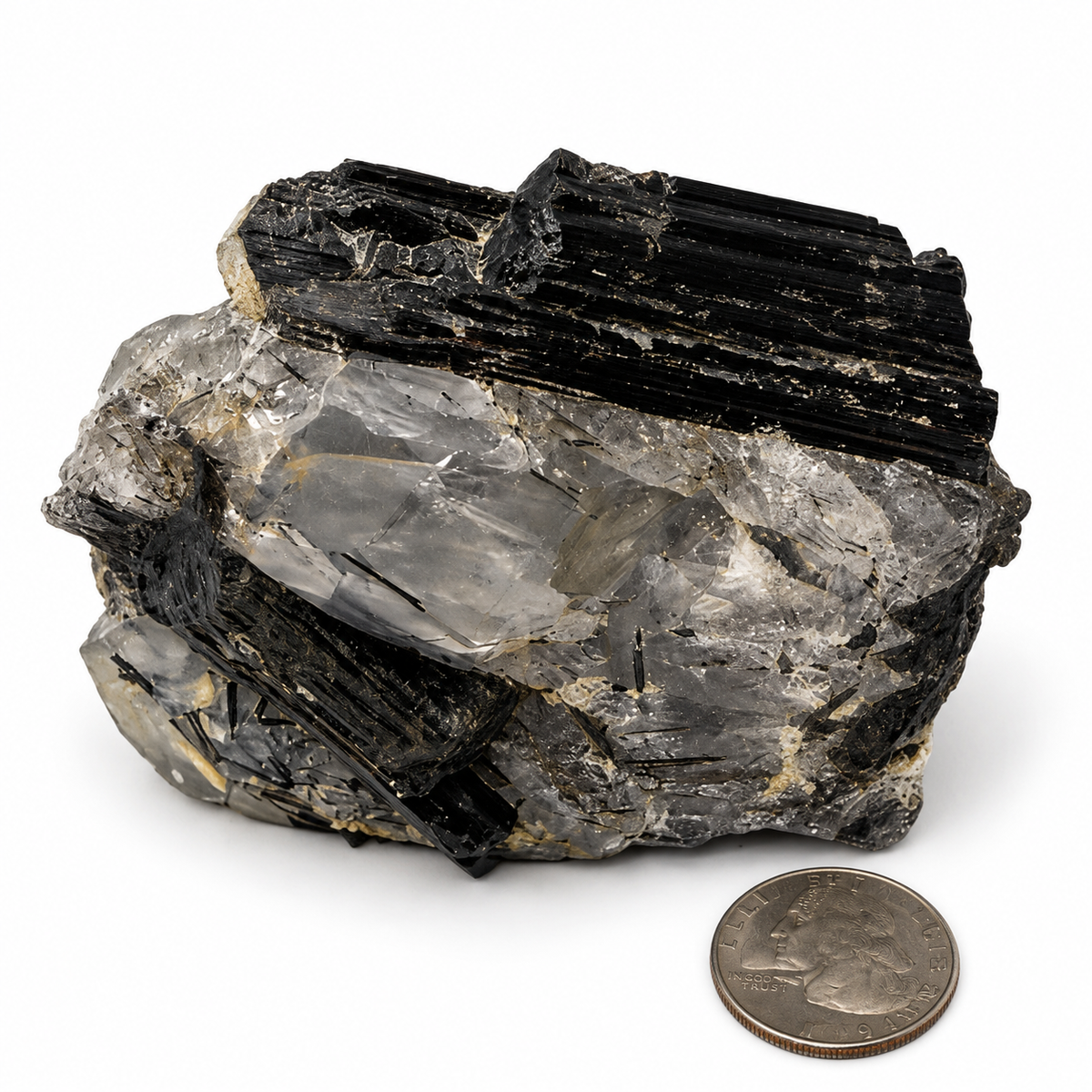 Tourmalinated quartz close-up showing black tourmaline needles inside clear quartz - Magick Souls