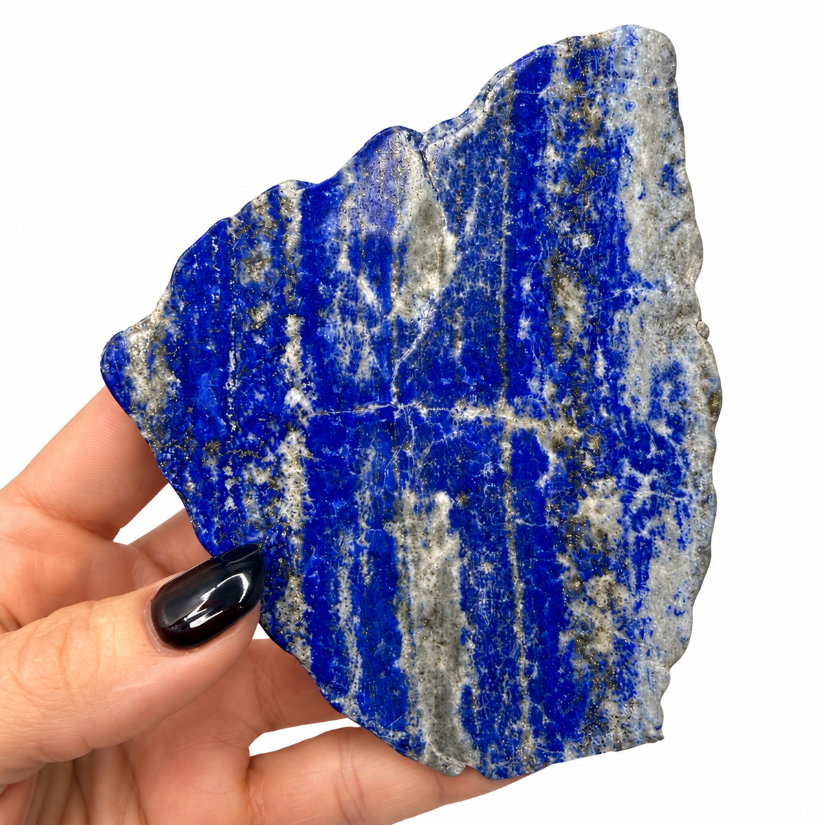 Deep blue lapis lazuli slab showing horizontal white calcite and golden pyrite bands - Magick Souls