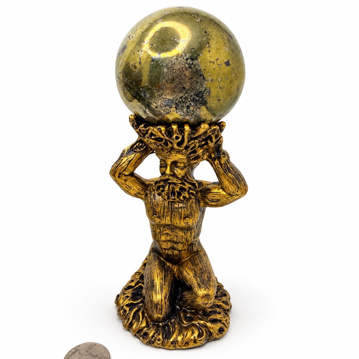 Golden pyrite sphere held overhead by gold kneeling God figure sphere stand