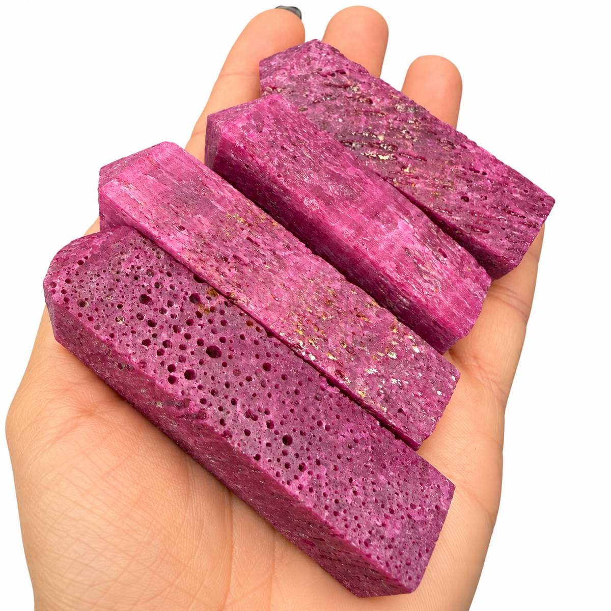 Honeycomb ruby towers glowing red under UV light - Magick Souls