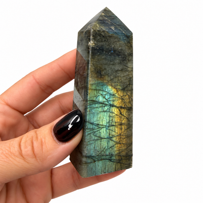 Labradorite tower with blue and gold flash, shown next to a quarter for scale - Magick Souls