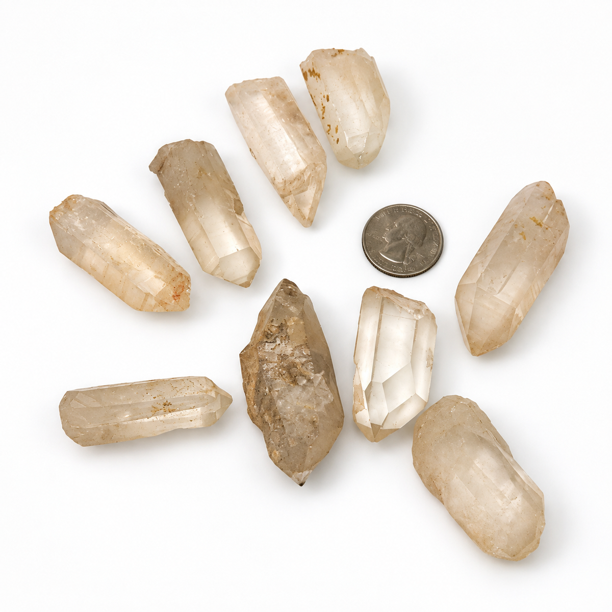Raw Lithium Quartz crystal points from Brazil in soft peachy pink