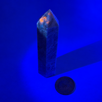 Hackmanite tower glowing under UV light - Magick Souls