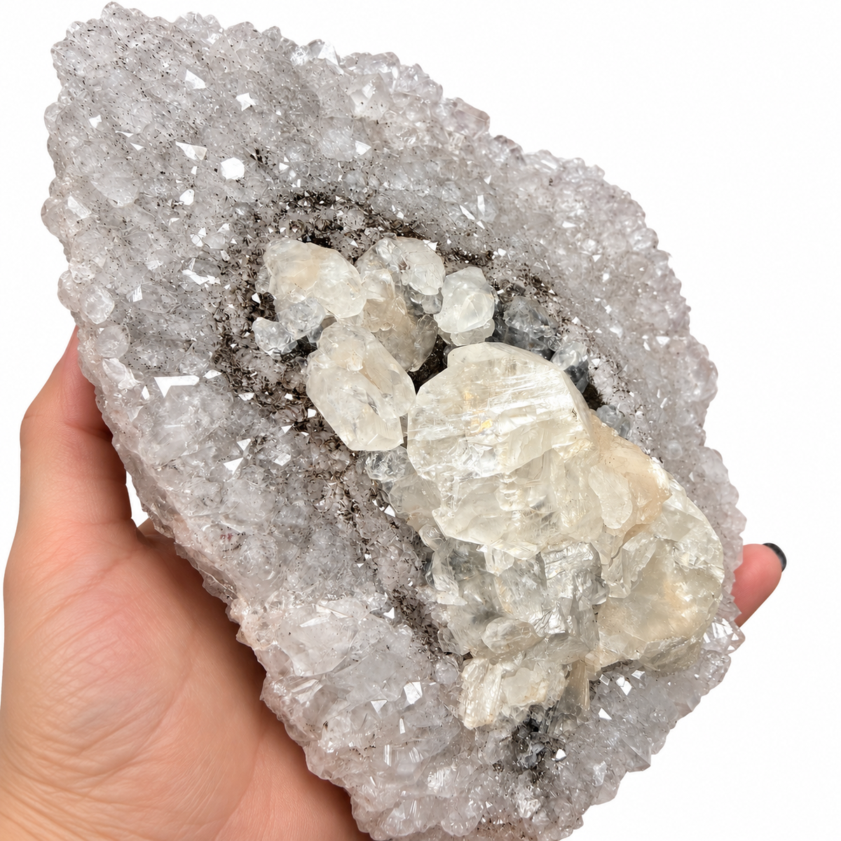 Clear quartz crystals with dark mineral inclusions around creamy calcite - Magick Souls