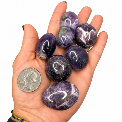 Polished chevron dream amethyst tumbles with purple and white banding - Magick Souls