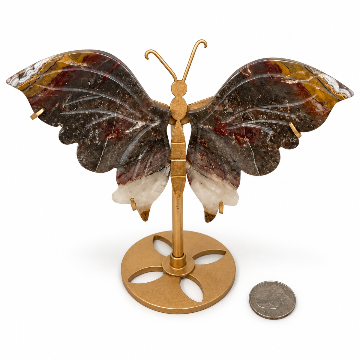 Carved Indonesian agate butterfly wings on gold stand with brown jasper, banded agate and quartz tips, next to a quarter for scale - Magick Souls