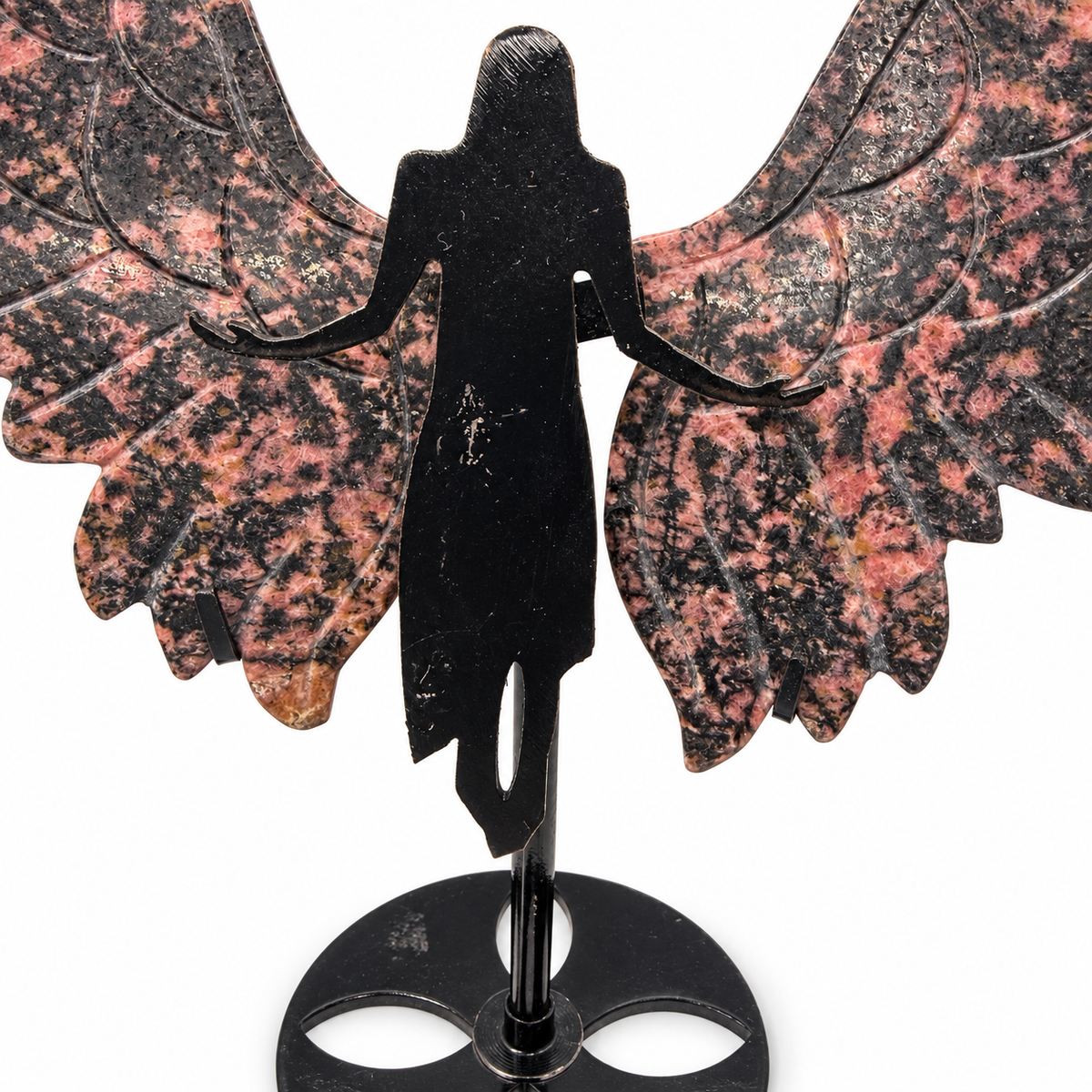 Rhodonite crystal angel wings close-up showing carved feather detail - Magick Souls