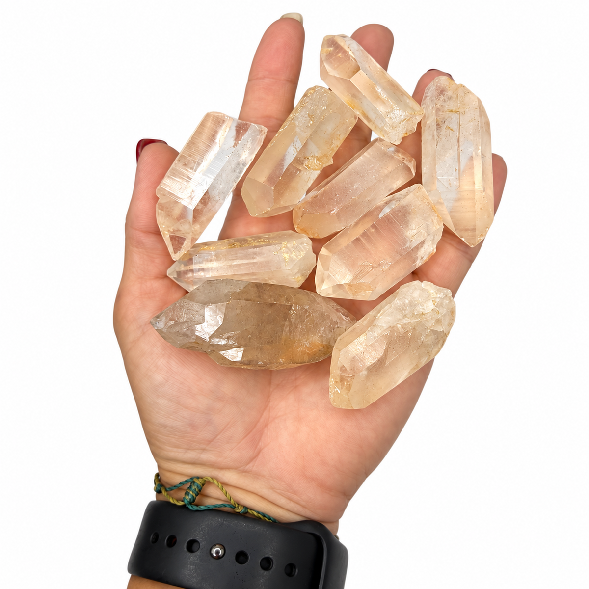 Handful of natural Lithium Quartz points showing size