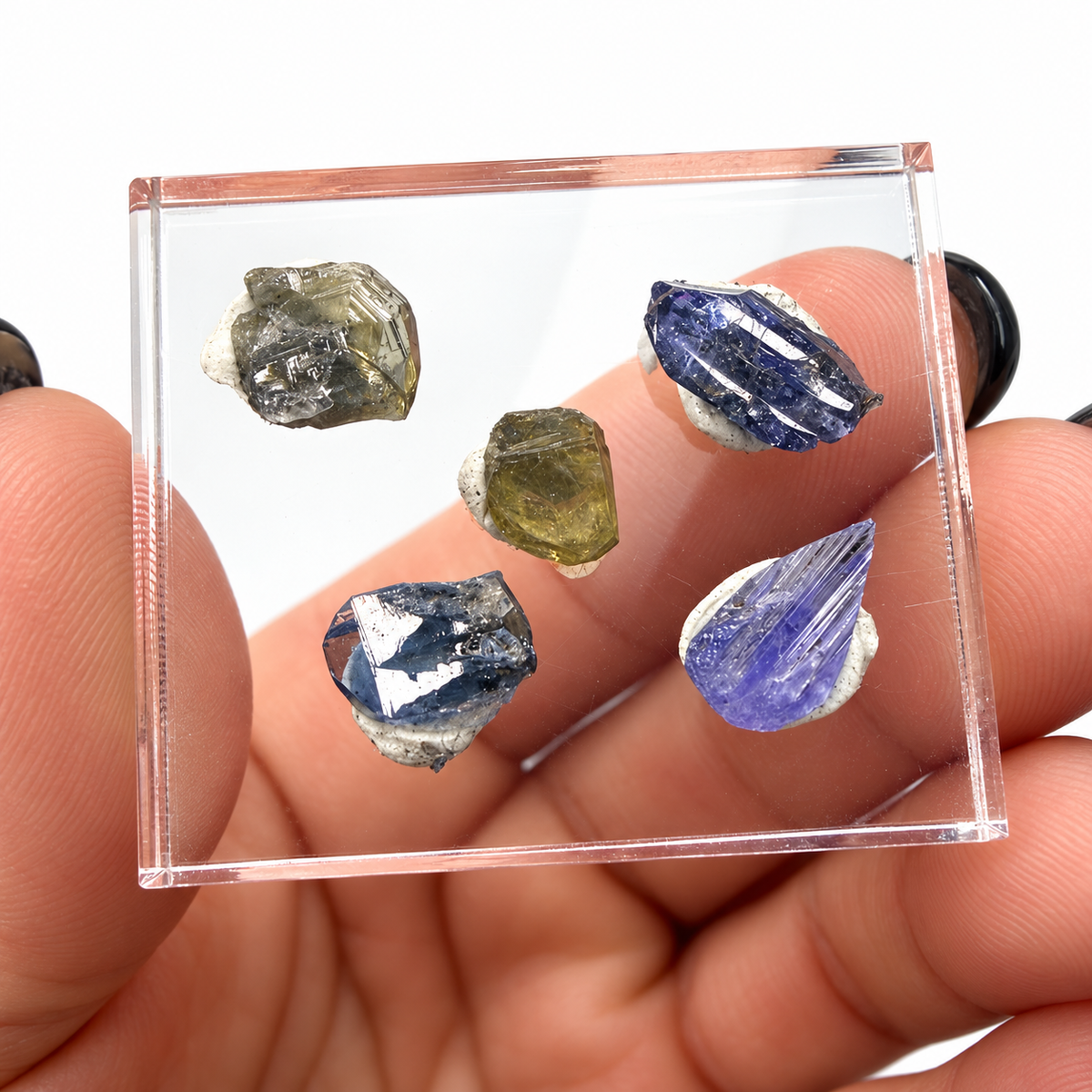 Lavender, indigo, blue and olive raw tanzanite crystals from Tanzania - Magick Souls