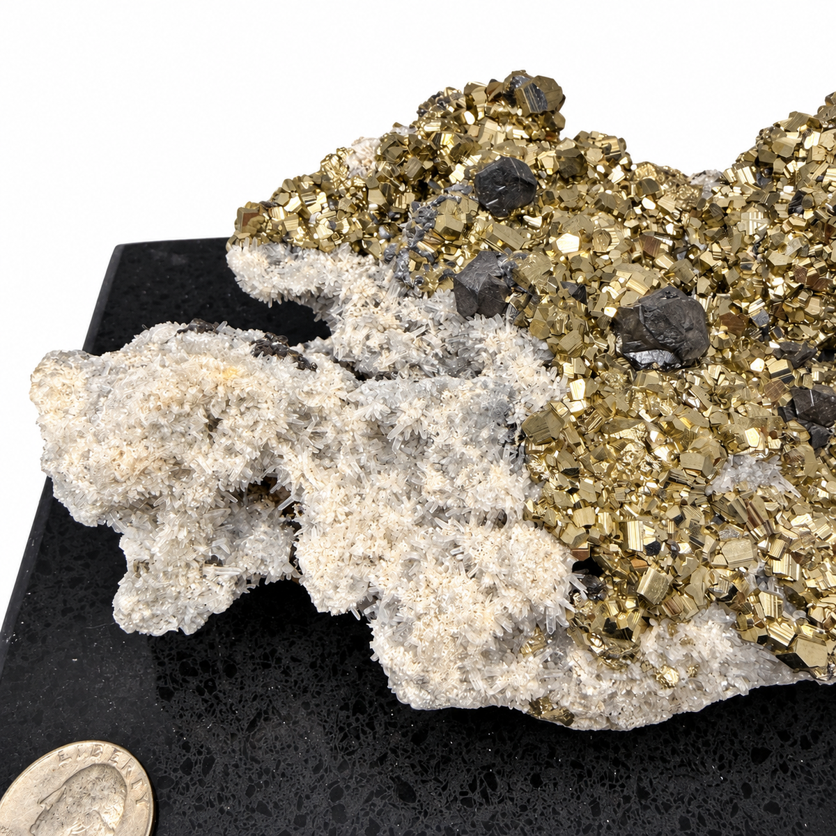 Additional angle of large pyrite with galena in quartz specimen on display base