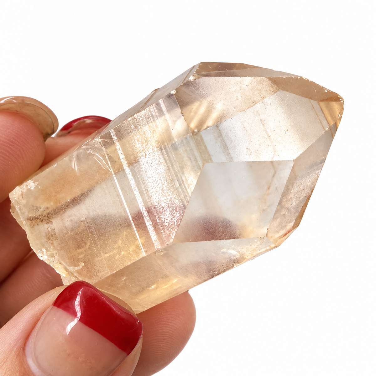 Close-up of a natural Lithium Quartz point with inclusions