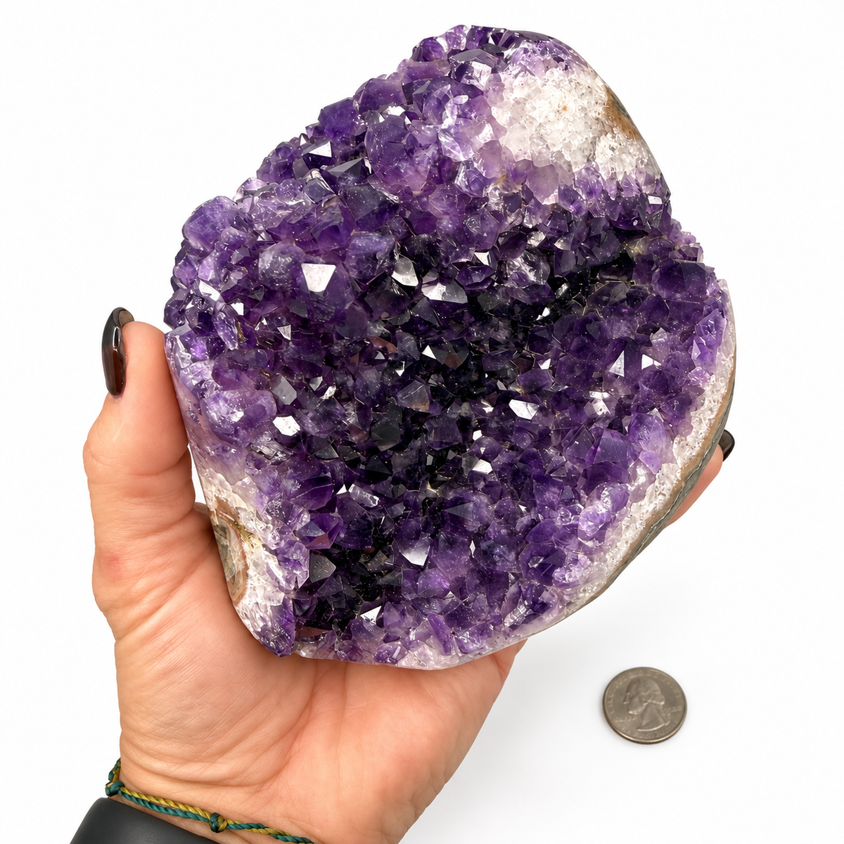 Glassy deep purple amethyst crystal points close-up - Magick Souls