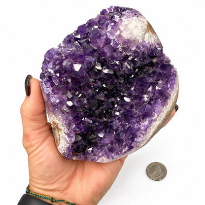 Glassy deep purple amethyst crystal points close-up - Magick Souls