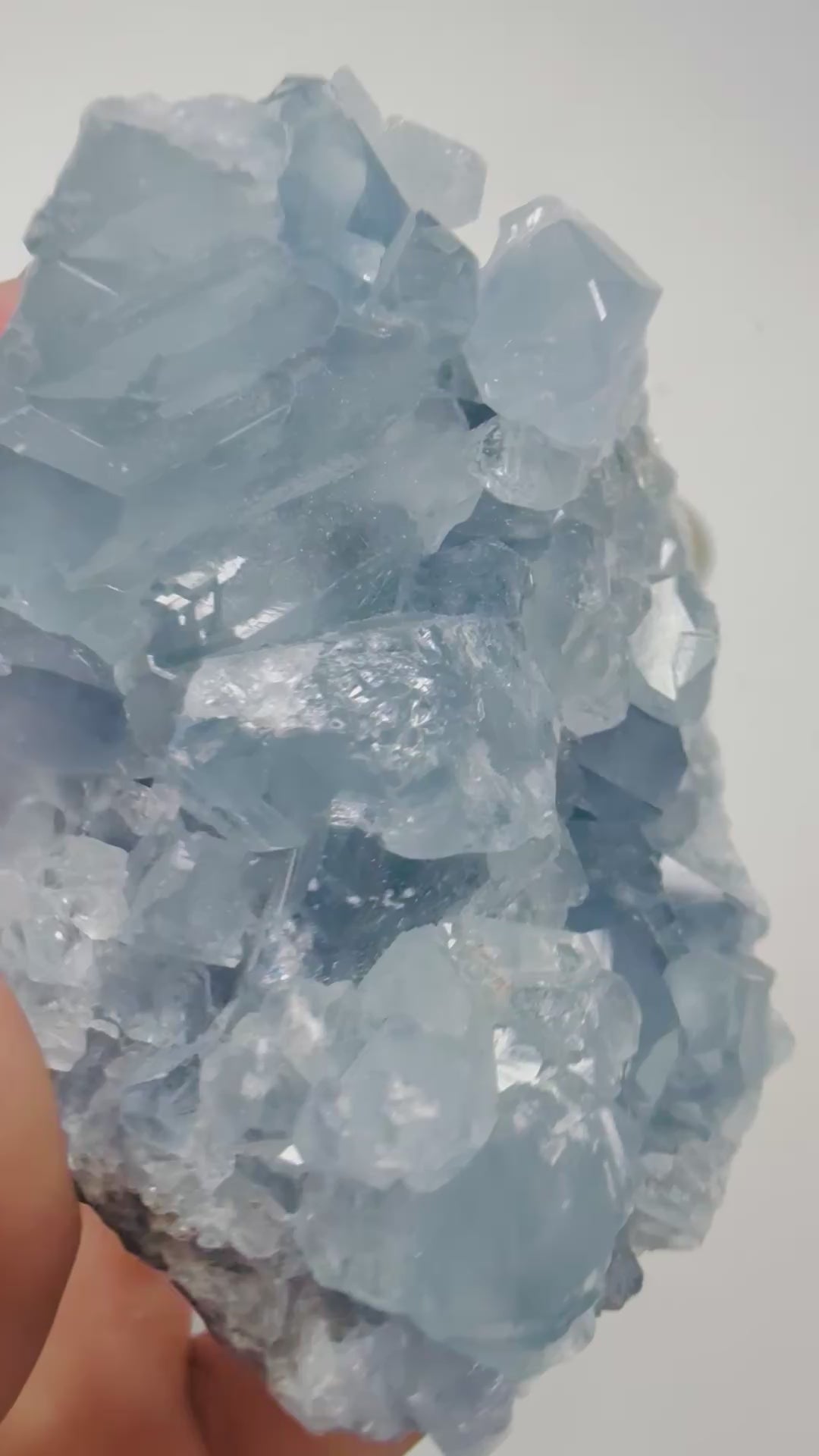 Video of a natural blue Celestite crystal cluster catching the light