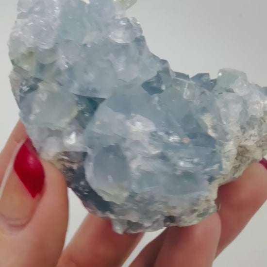 Video of a natural blue Celestite crystal cluster catching the light