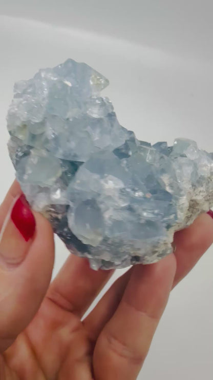 Video of a natural blue Celestite crystal cluster catching the light