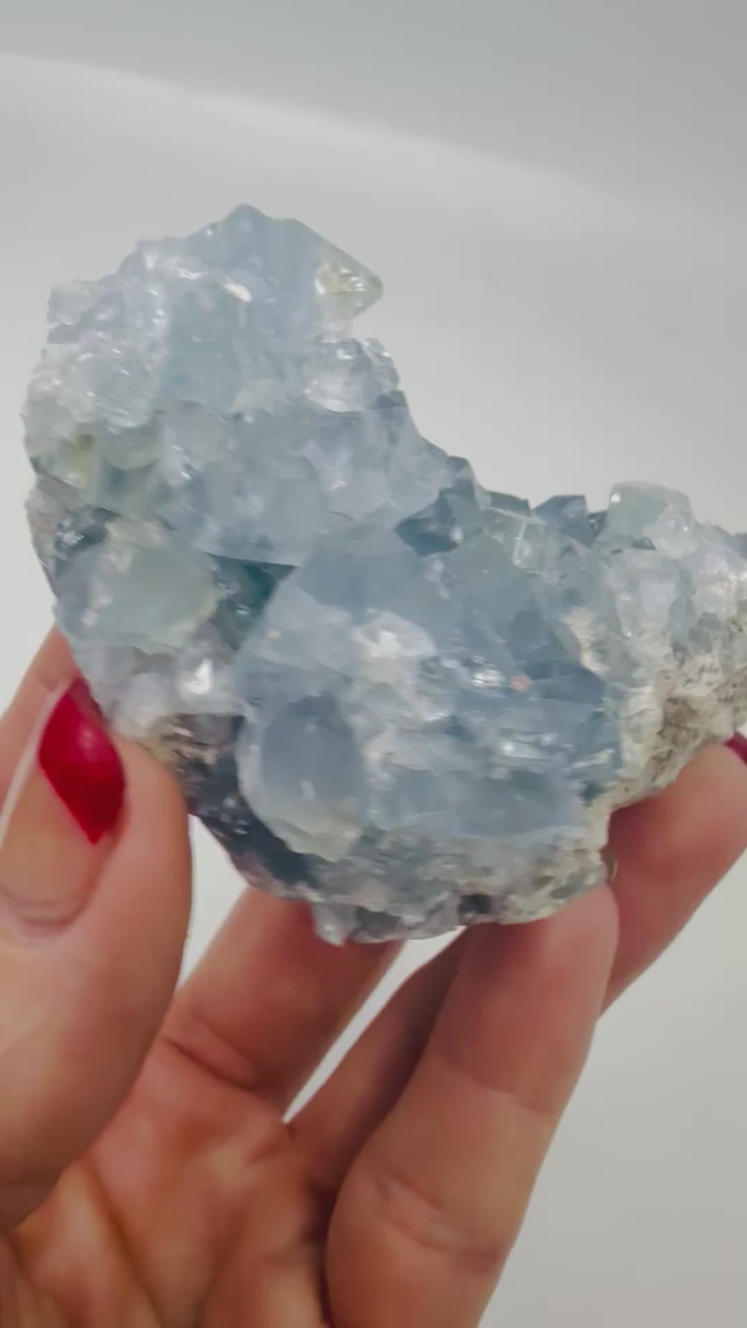 Video of a natural blue Celestite crystal cluster catching the light