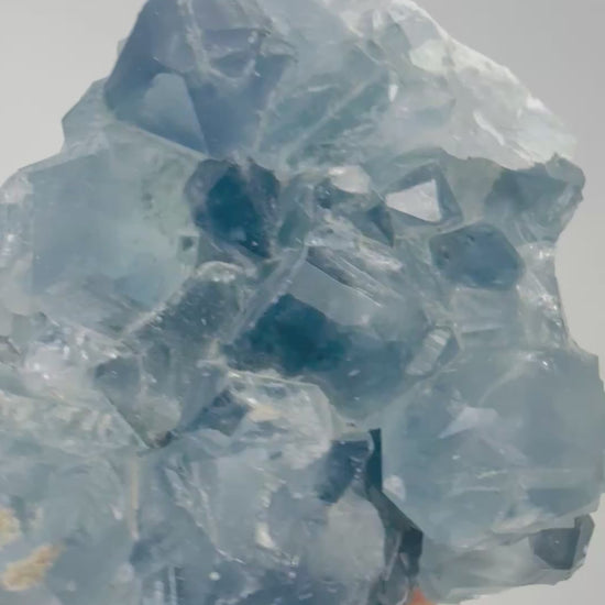 Video of a blue Celestite crystal cluster shimmering in the light