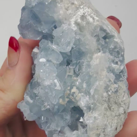 Video of a natural Celestite crystal cluster sparkling